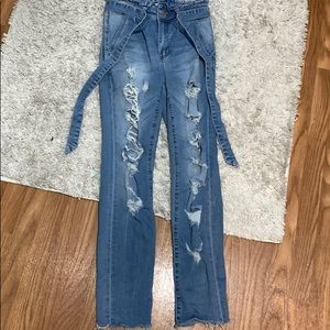 Ripped ruffled jeans